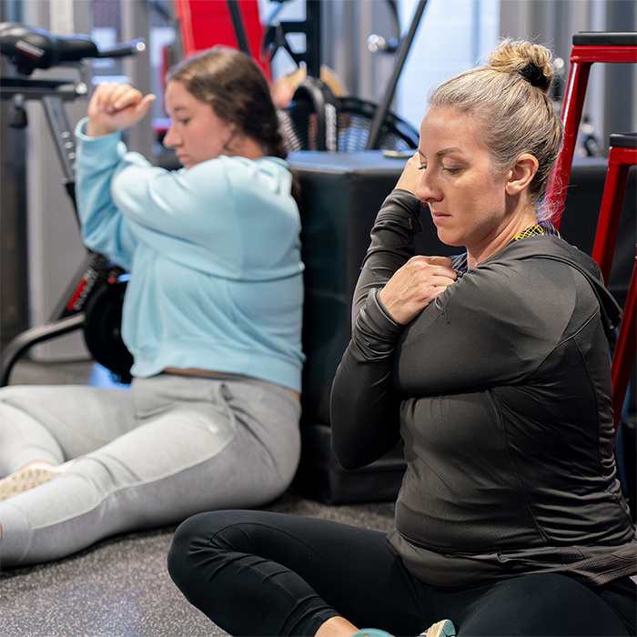 Students performing a stretch