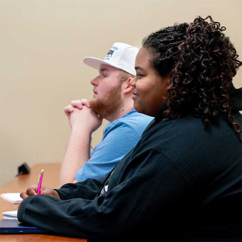 An economics student in the classroom