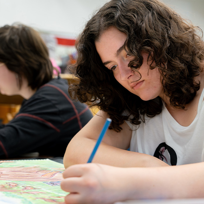 An art student working on a project. An art student working on a project.