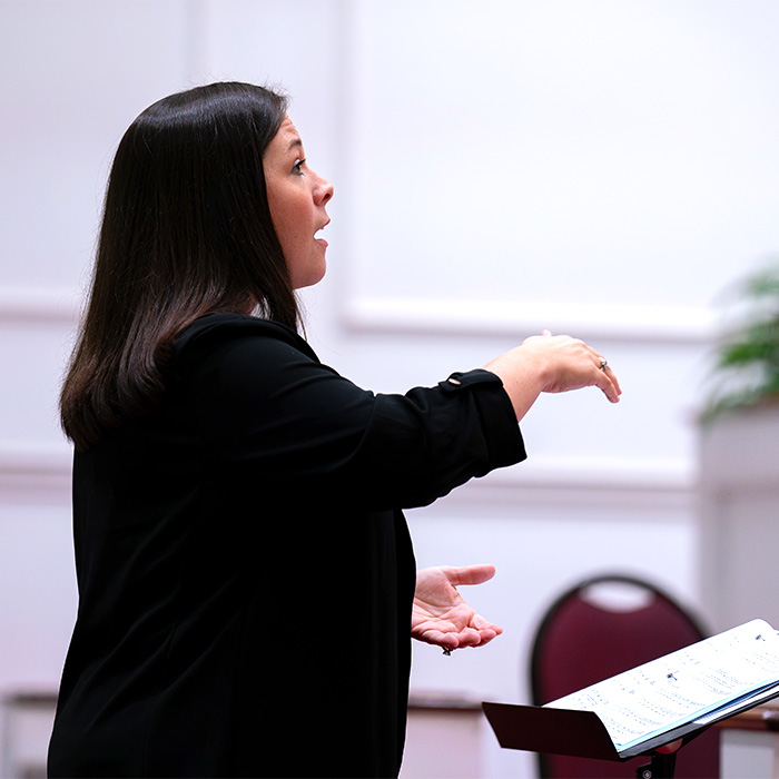 A person conducting music