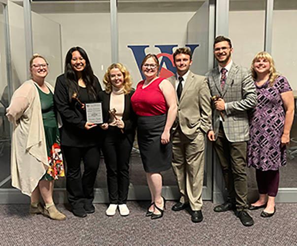Debate Team Hosts Tournament, Captures Awards