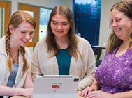 Students work with a professor