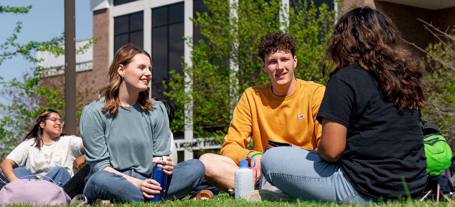Students siting outside on the Walters State campus.